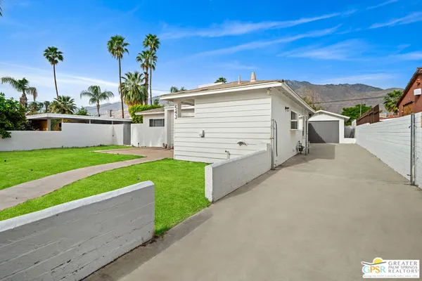 a view of a back yard of the house
