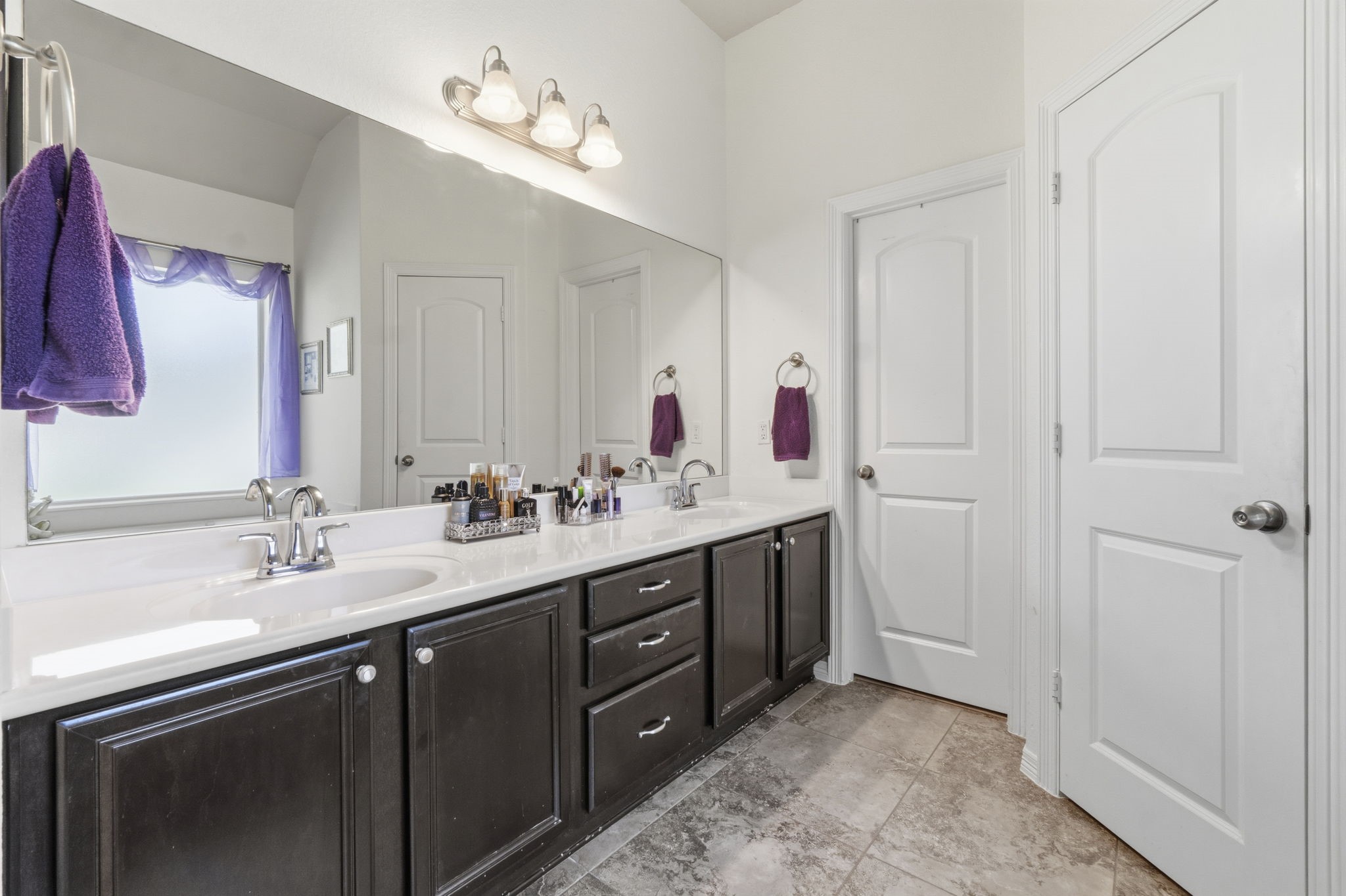 10802 Windswept Montgomery, TX 77356 - Photo 34 of 42 a bathroom with a double vanity sink and a mirror
