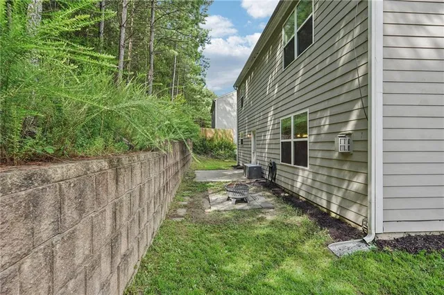 a view of a backyard with plants
