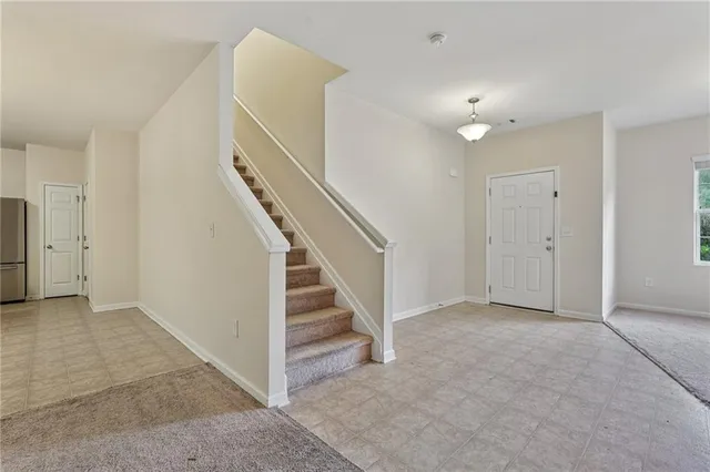 a view of entryway with stairs