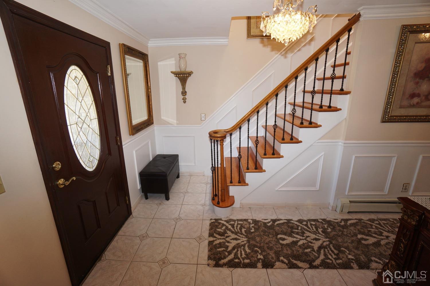 77 Inwood Avenue Colonia, NJ 07067 - Photo 13 of 37 a view of entryway and hall with wooden floor