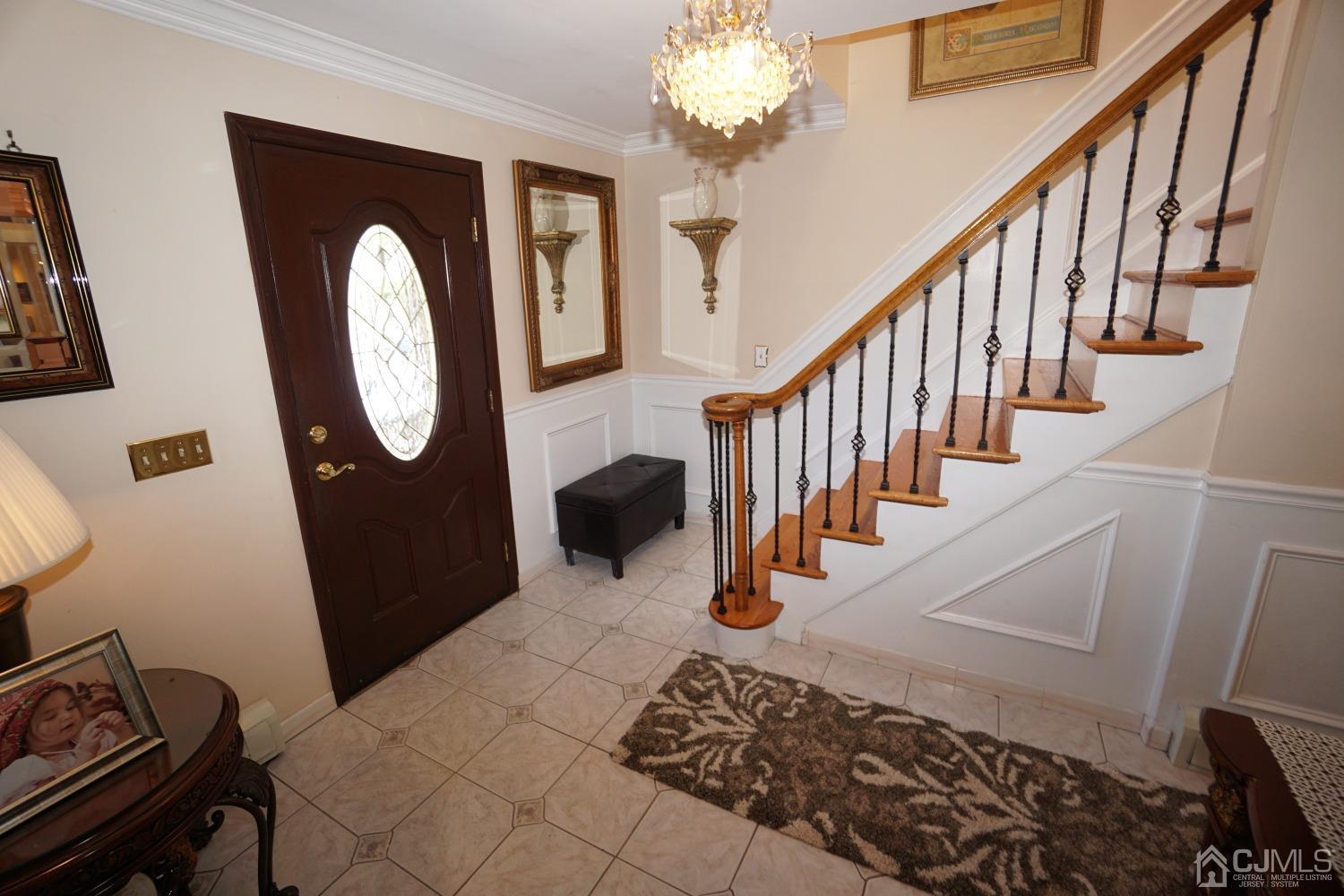 77 Inwood Avenue Colonia, NJ 07067 - Photo 22 of 37 a view of entryway and hall with wooden floor