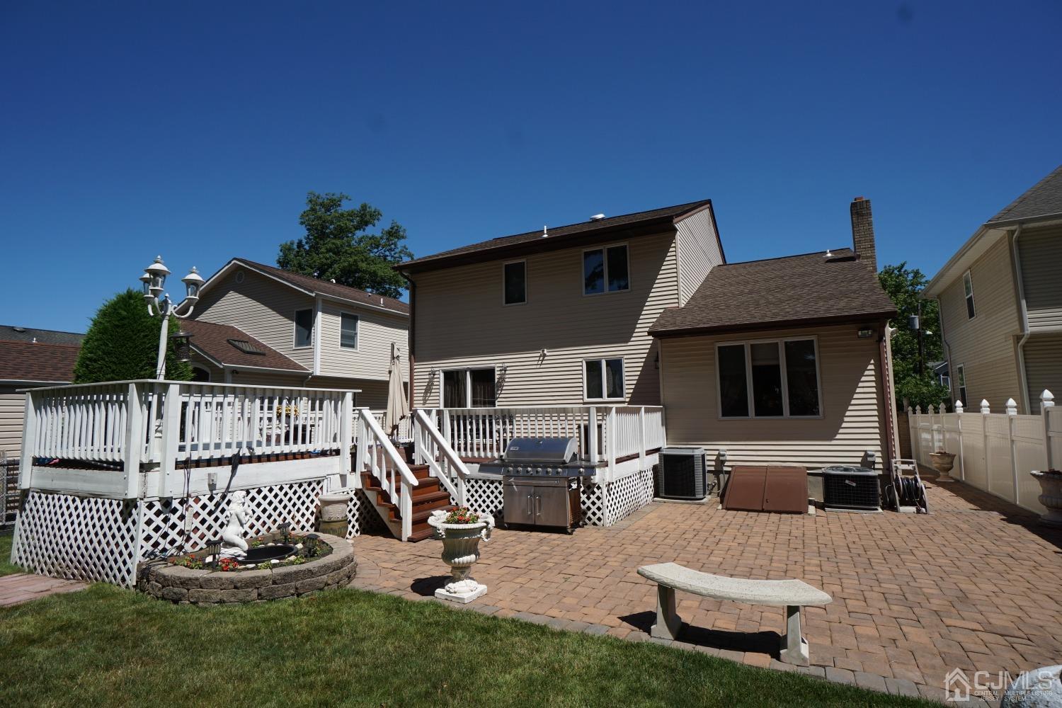 77 Inwood Avenue Colonia, NJ 07067 - Photo 29 of 37 a front view of a house with garden