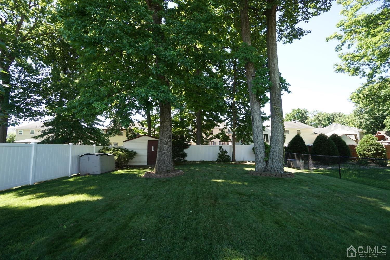 77 Inwood Avenue Colonia, NJ 07067 - Photo 37 of 37 a view of a house with a yard