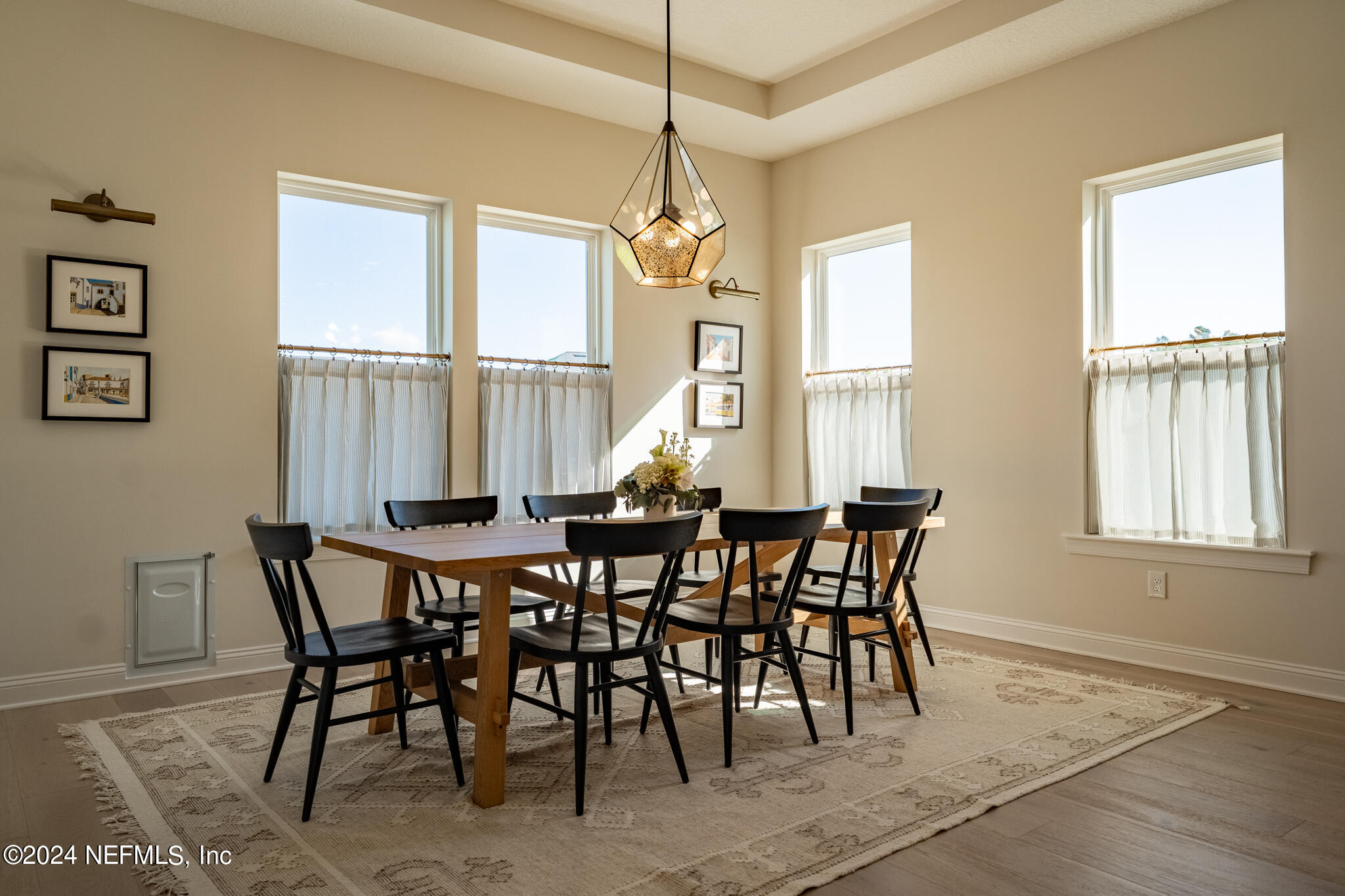 88 Awlleaf Court St. Augustine, FL 32095 - Photo 22 of 107 a view of a dining room with furniture window and wooden floor