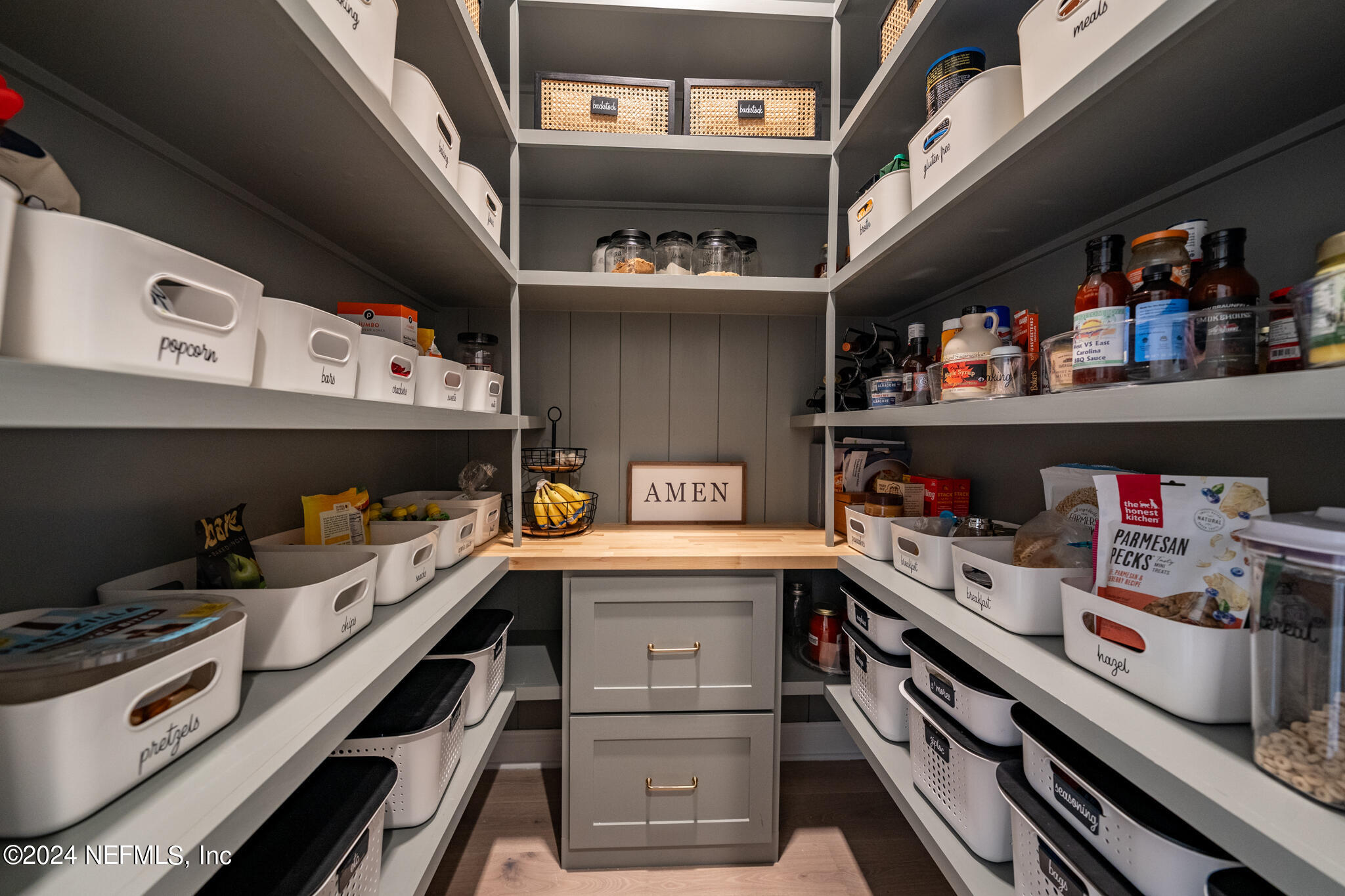 88 Awlleaf Court St. Augustine, FL 32095 - Photo 25 of 107 a kitchen with lots of clutter and cabinets