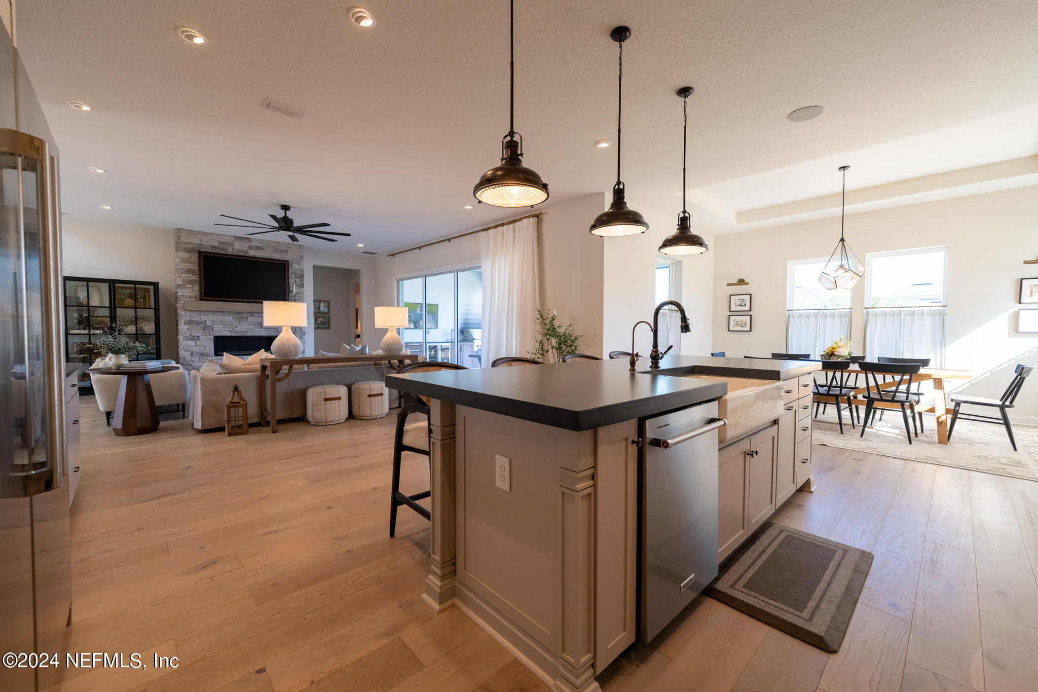 88 Awlleaf Court St. Augustine, FL 32095 - Photo 26 of 107 a kitchen with lots of counter space dining table and chairs