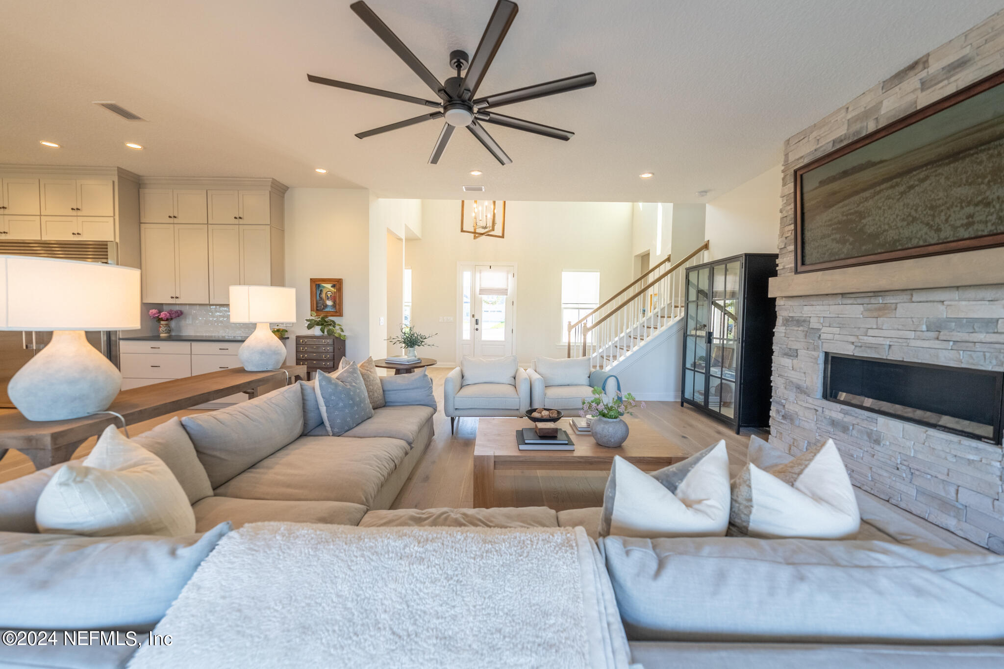 88 Awlleaf Court St. Augustine, FL 32095 - Photo 28 of 107 a living room with furniture and a fireplace