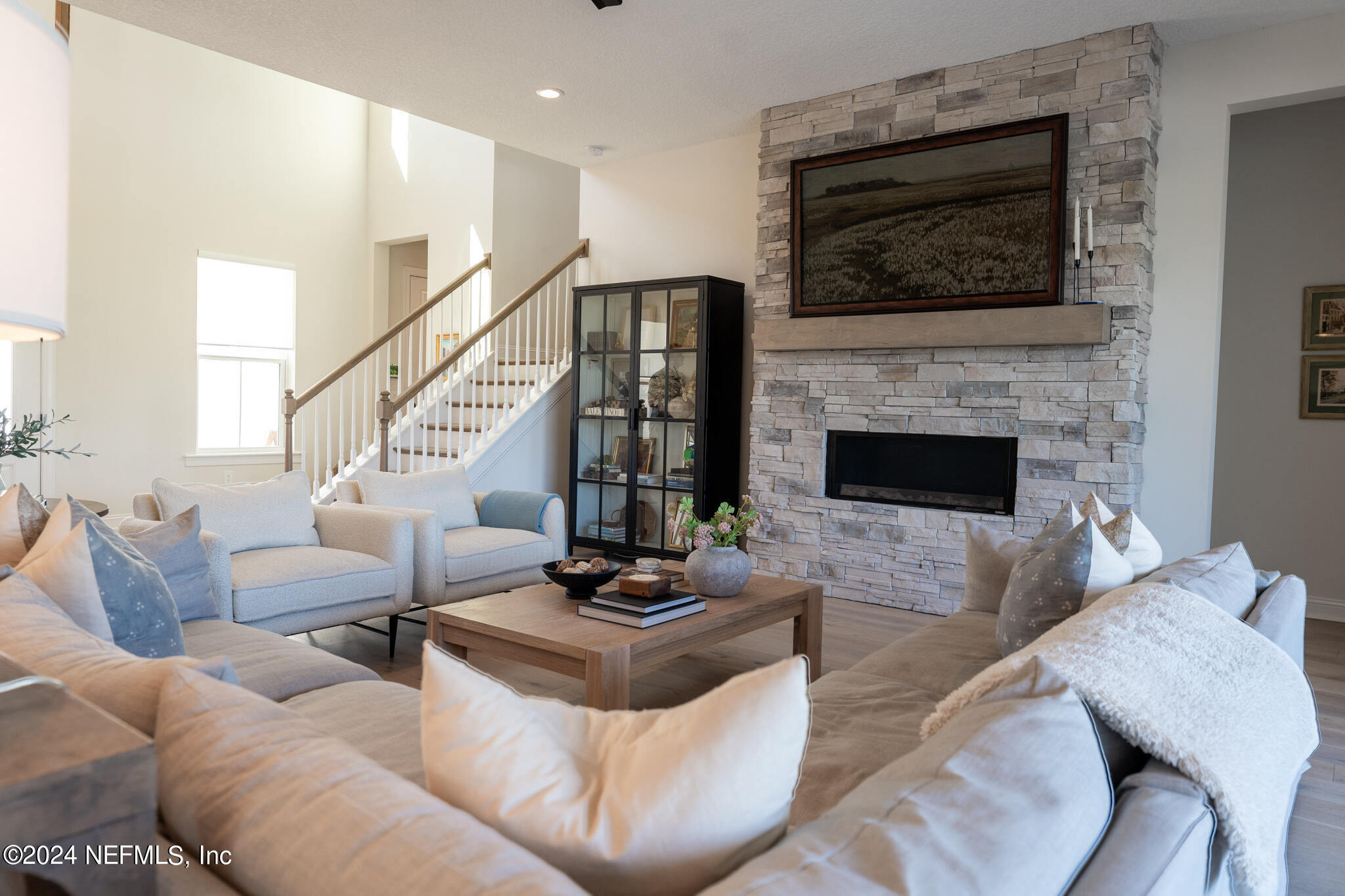 88 Awlleaf Court St. Augustine, FL 32095 - Photo 31 of 107 a living room with furniture fireplace and flat screen tv