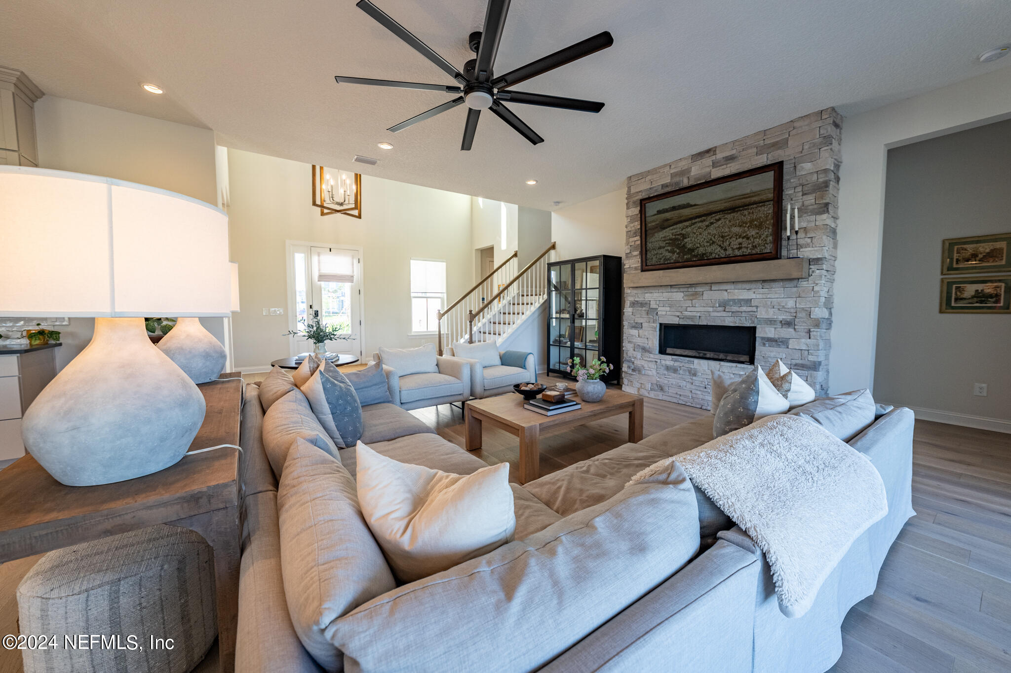 88 Awlleaf Court St. Augustine, FL 32095 - Photo 33 of 107 a living room with furniture and a fireplace