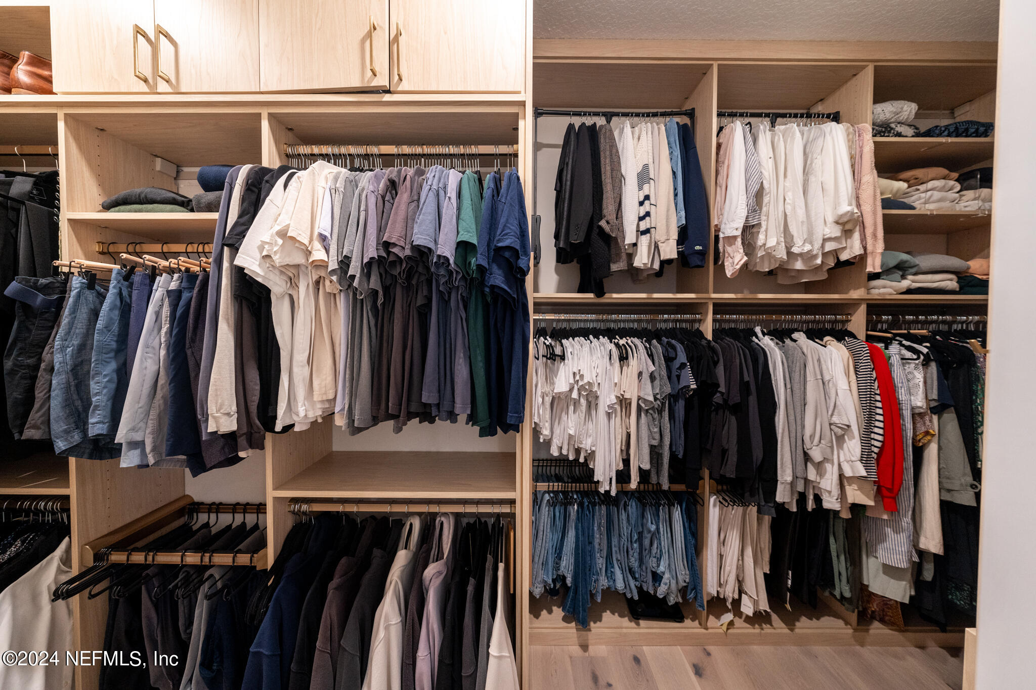 88 Awlleaf Court St. Augustine, FL 32095 - Photo 42 of 107 a view of walk in closet with clothes and shoes