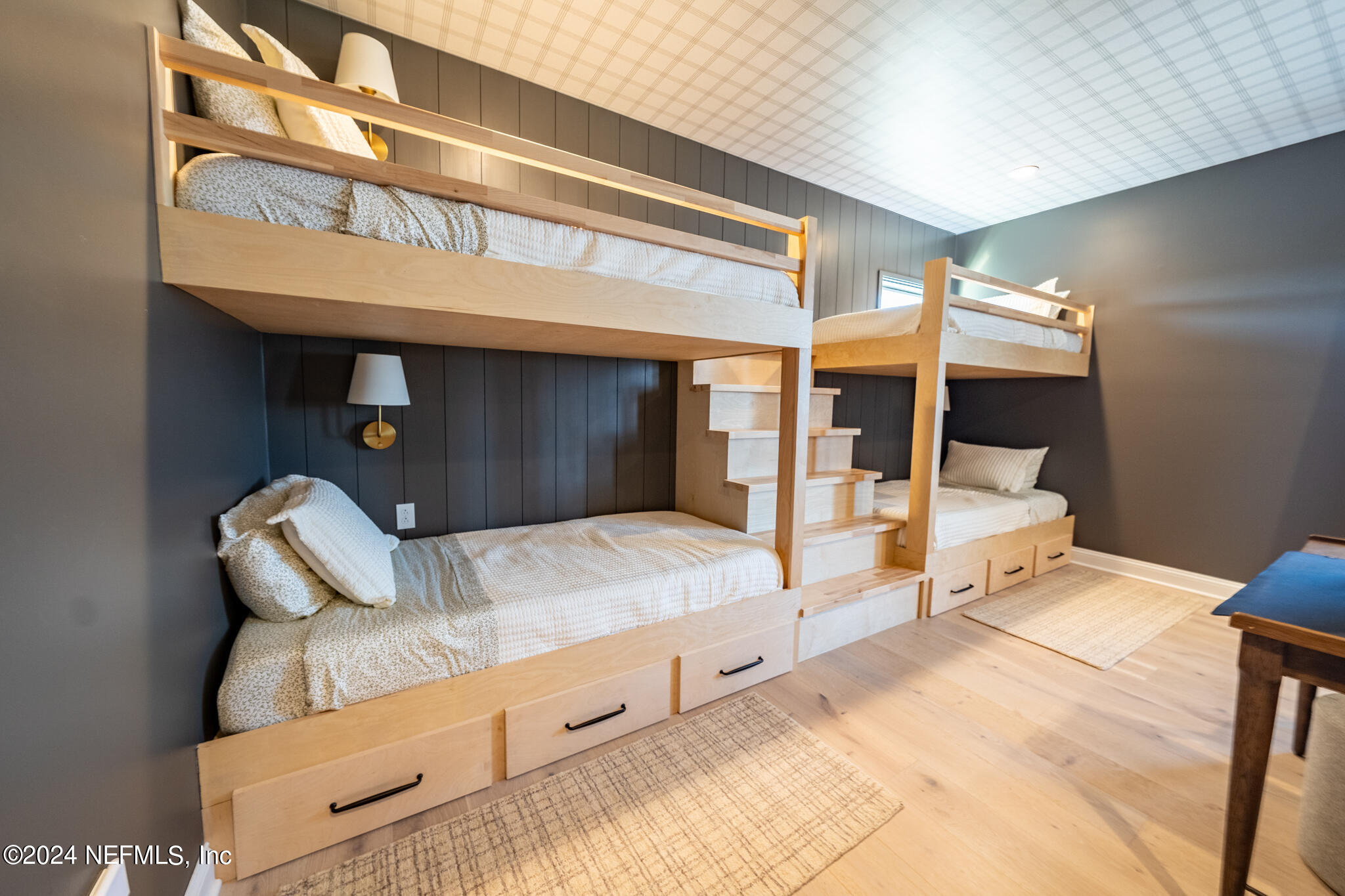 88 Awlleaf Court St. Augustine, FL 32095 - Photo 70 of 107 a spacious bedroom with a bed and a large mirror