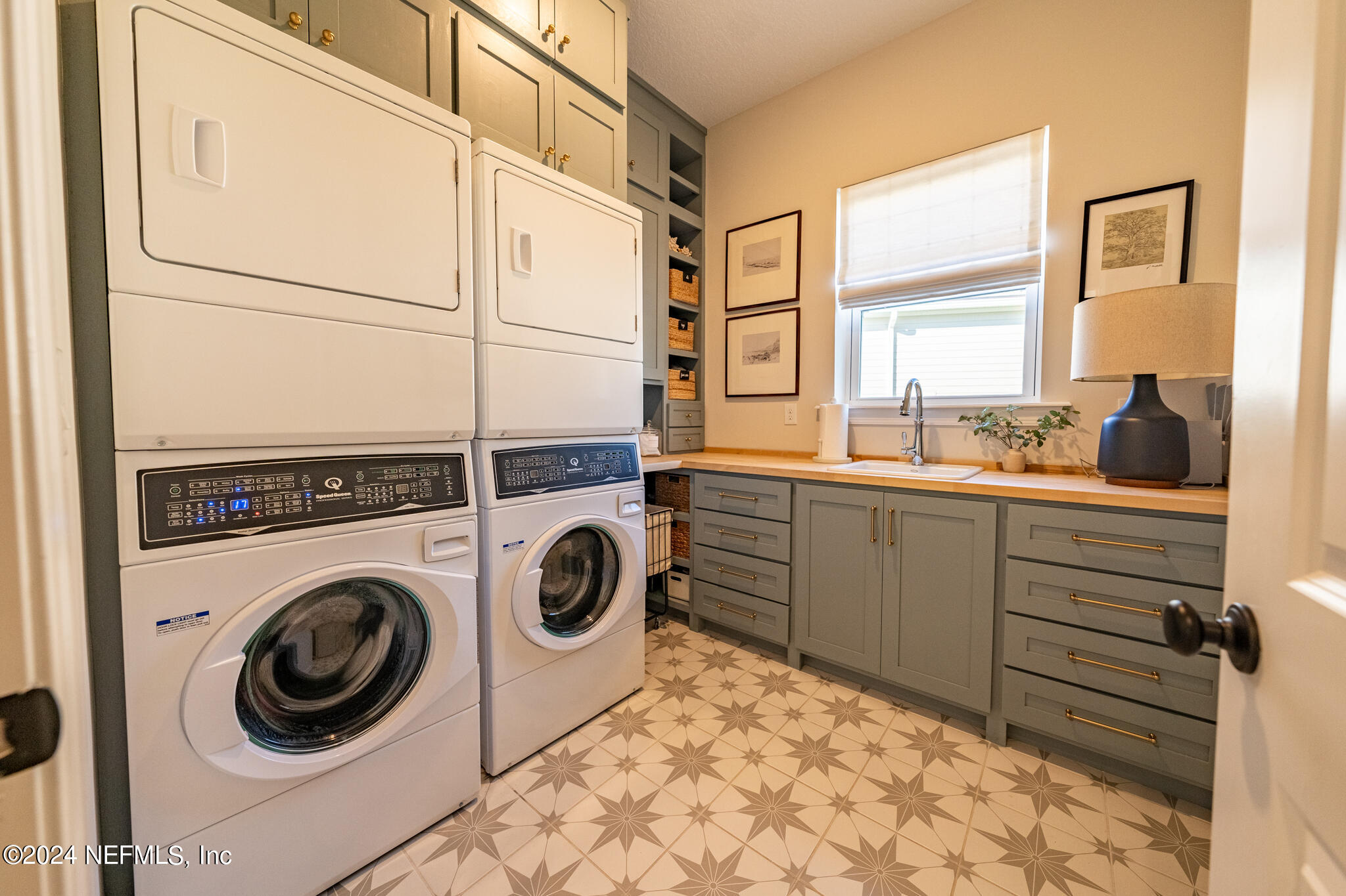 88 Awlleaf Court St. Augustine, FL 32095 - Photo 78 of 107 a utility room with sink dryer and washer