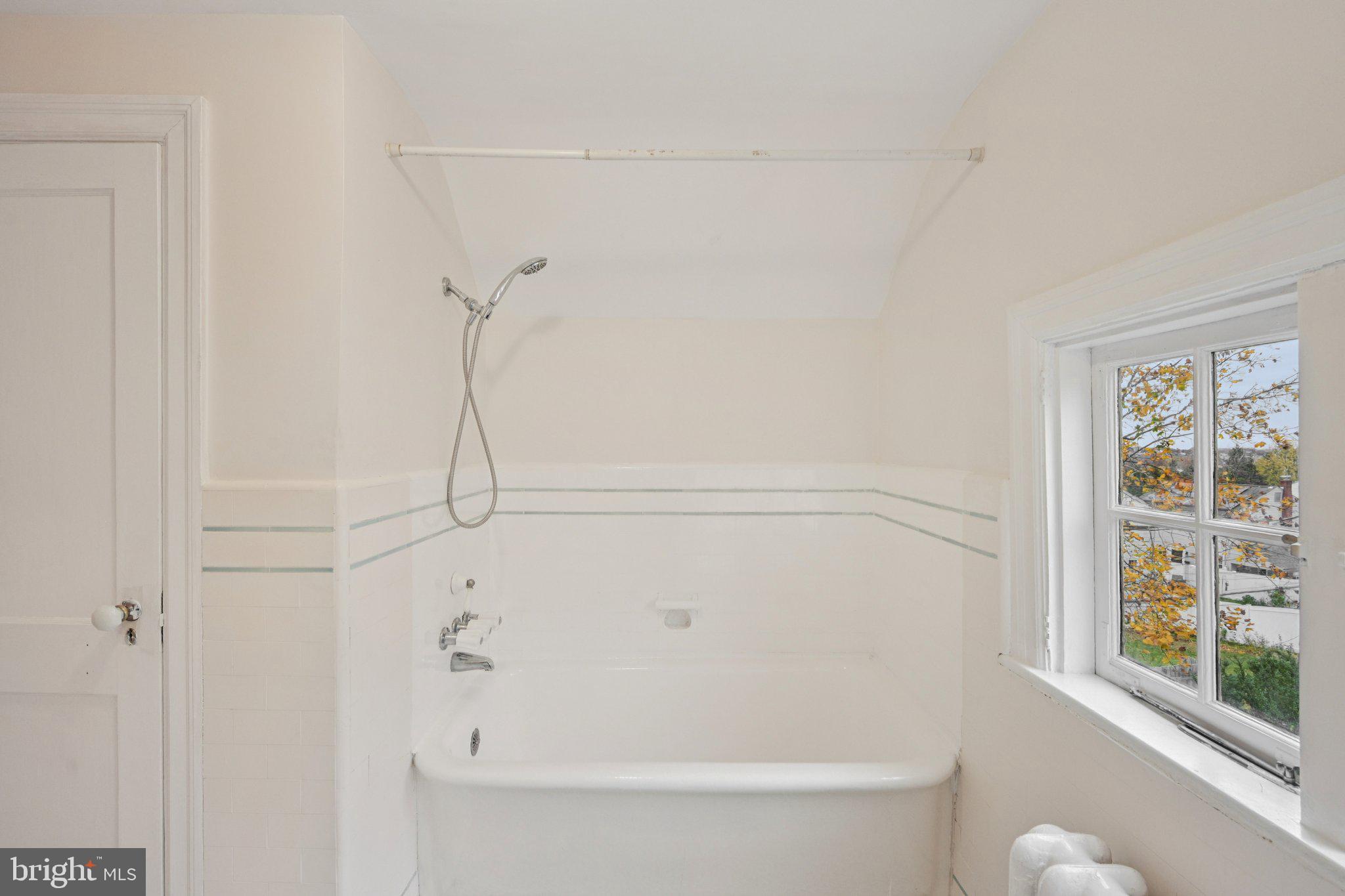 908 Edge Hill Road Glenside, PA 19038 - Photo 17 of 27 a bathroom with a bathtub