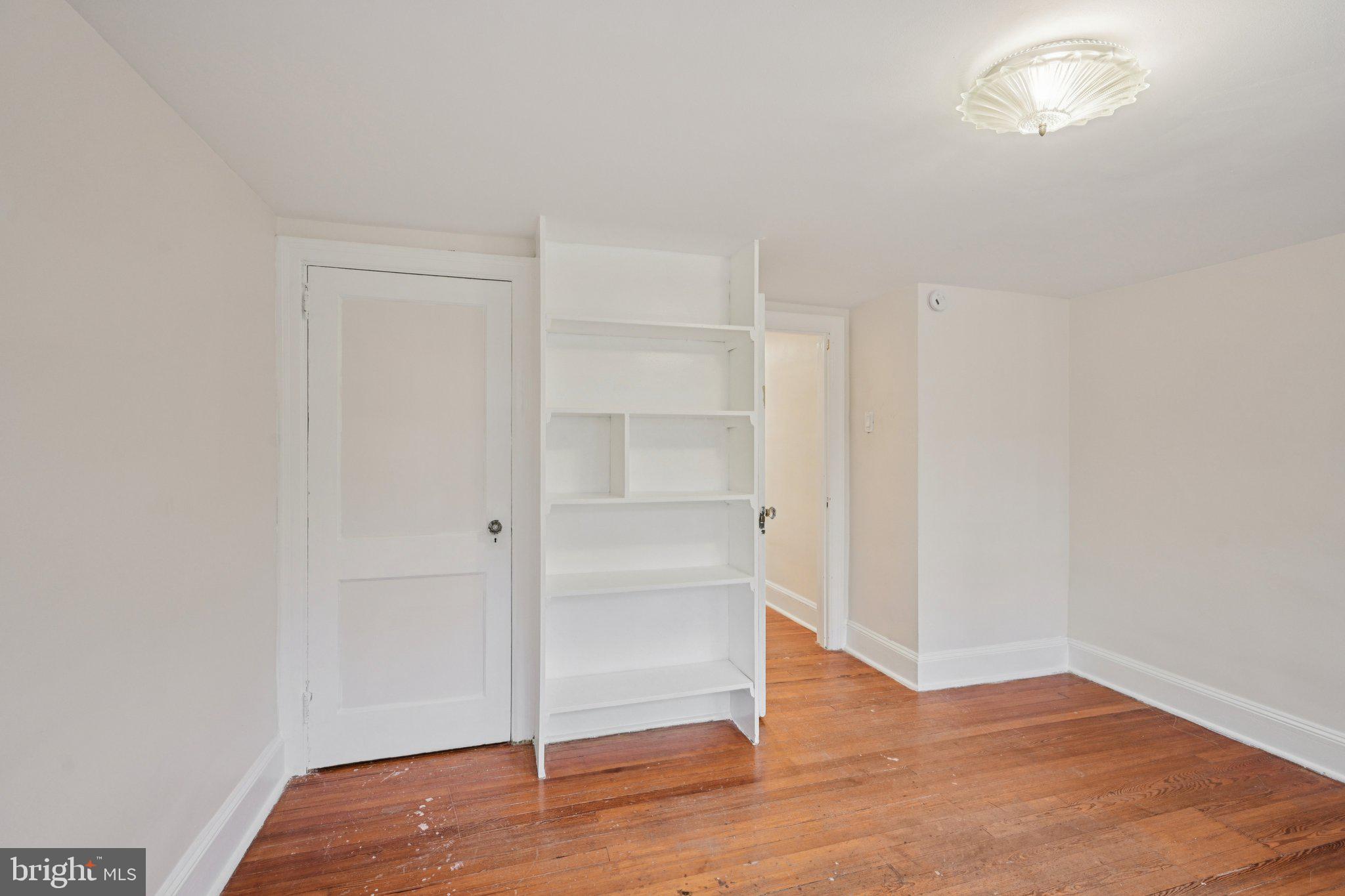 908 Edge Hill Road Glenside, PA 19038 - Photo 24 of 27 a view of an empty room with wooden floor