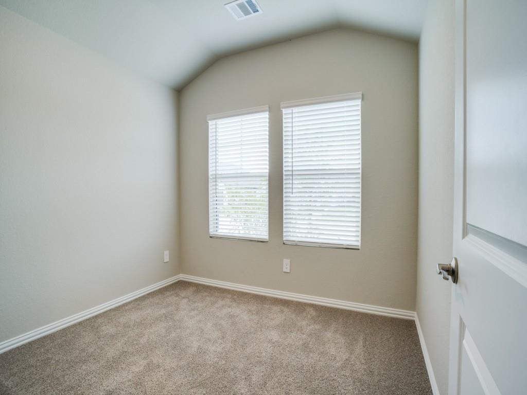 808 Tidal Drive McKinney, TX 75071 - Photo 13 of 26 an empty room with a window