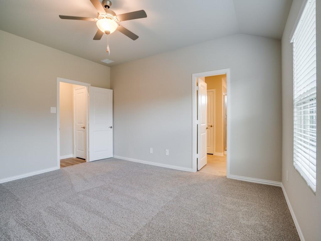 808 Tidal Drive McKinney, TX 75071 - Photo 14 of 26 an empty room with windows and closet area