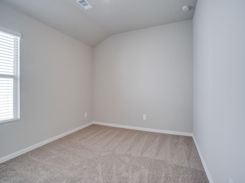 808 Tidal Drive McKinney, TX 75071 - Photo 19 of 26 an empty room with a window
