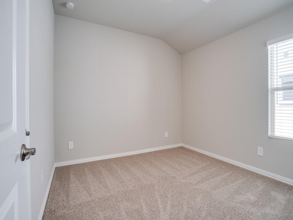 808 Tidal Drive McKinney, TX 75071 - Photo 22 of 26 an empty room with a window