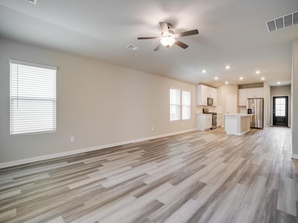 808 Tidal Drive McKinney, TX 75071 - Photo 6 of 26 a view of an empty room with a window