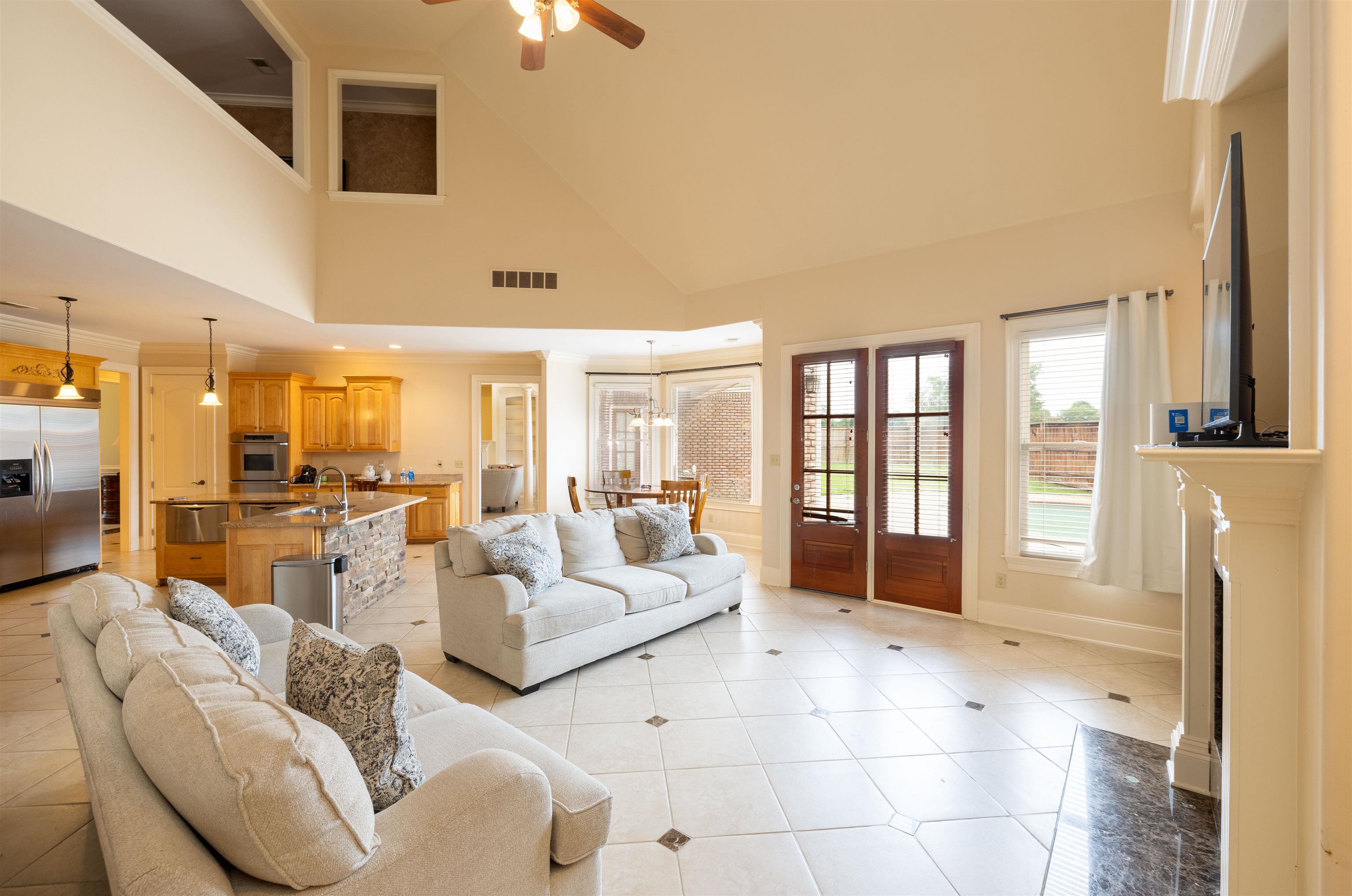 1042 Woodland Ridge Drive Cordova, TN 38018 - Photo 21 of 40 a living room with furniture and a large window