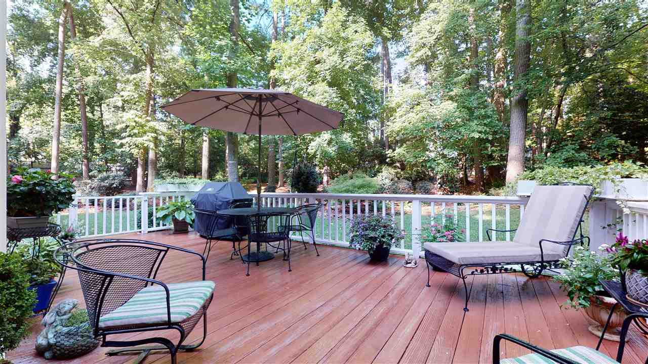 8817 Lomas Court Raleigh, NC 27615 - Photo 26 of 30 24 foot deck perfect for entertaining friends. Deck