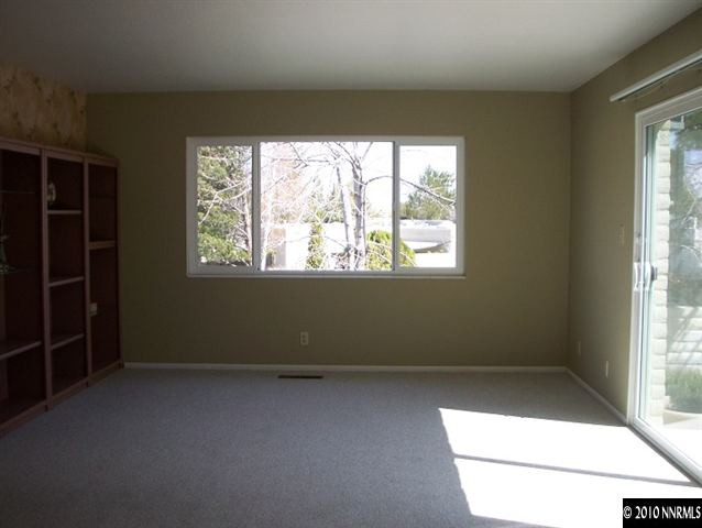 4931 Lakeridge Terrace West Reno, NV 89509 - Photo 7 of 9 an empty room with windows