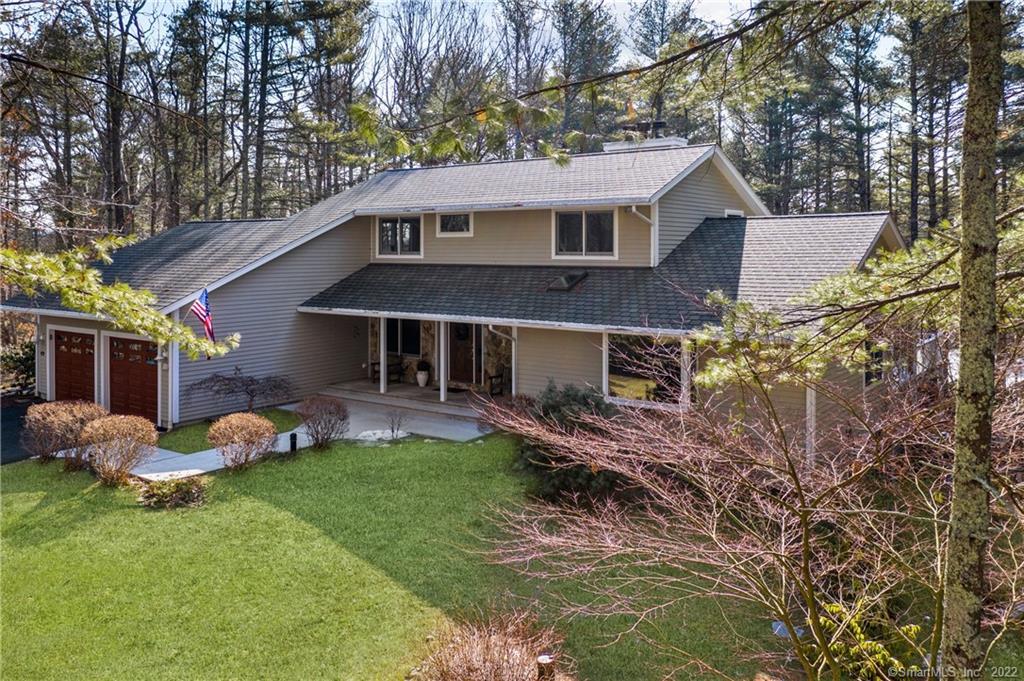 168 Kenwood Road Griswold, CT 06351 - Photo 1 of 1 a front view of a house with garden