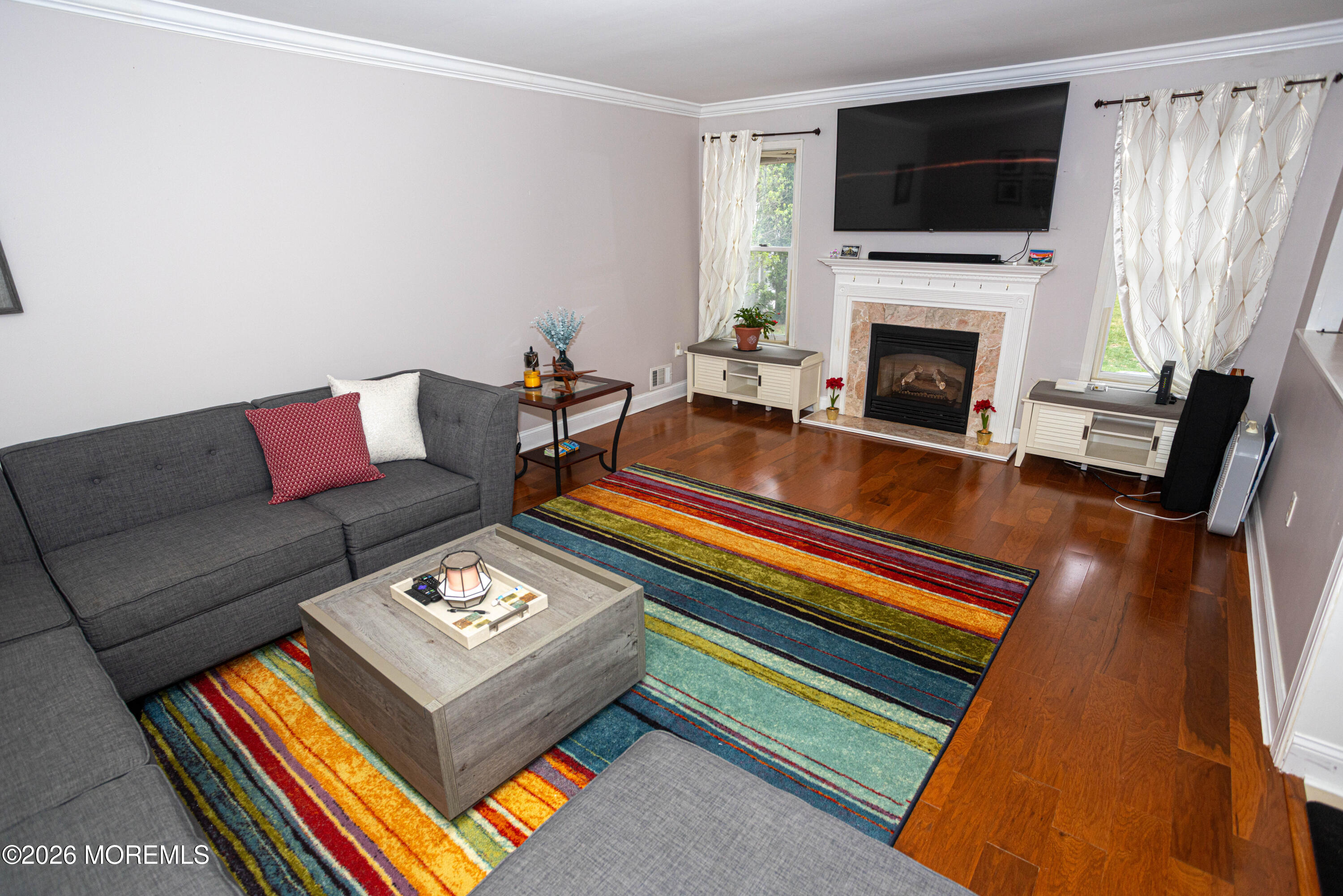 31 Scarlet Drive Parlin, NJ 08859 - Photo 25 of 67 a living room with furniture and a fireplace