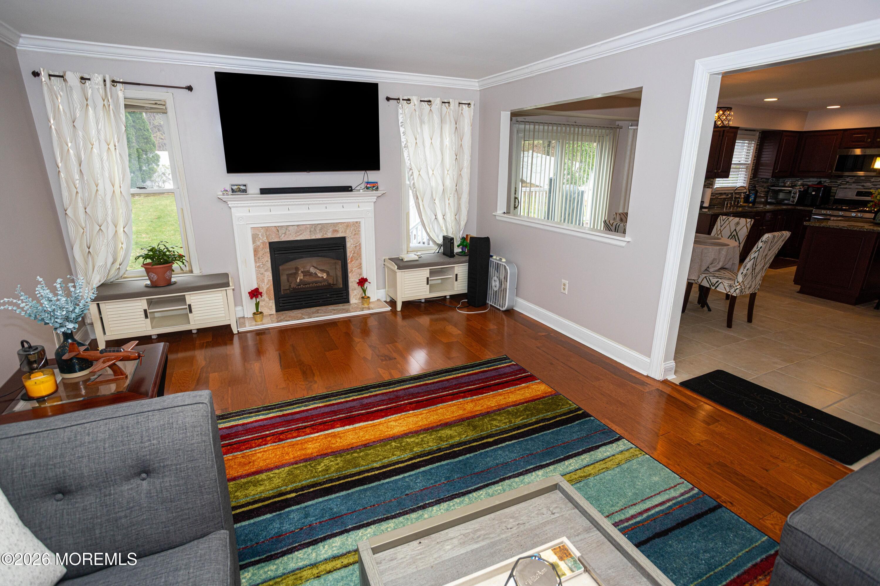 31 Scarlet Drive Parlin, NJ 08859 - Photo 26 of 67 a living room with furniture fireplace and flat screen tv