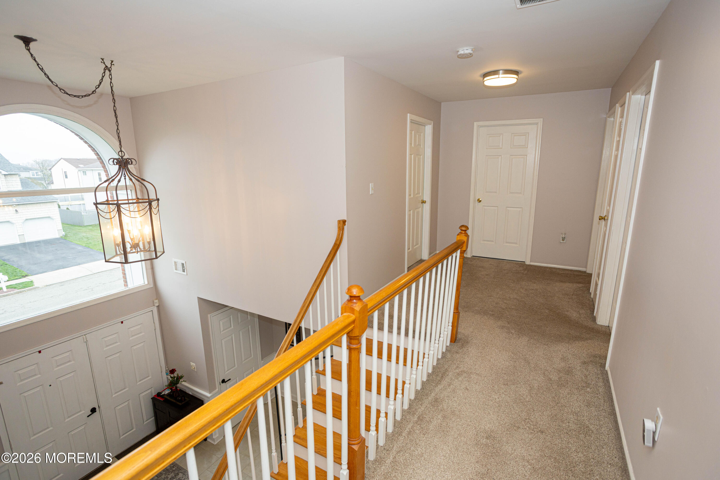31 Scarlet Drive Parlin, NJ 08859 - Photo 30 of 67 a view of a hallway with wooden floor and stairs