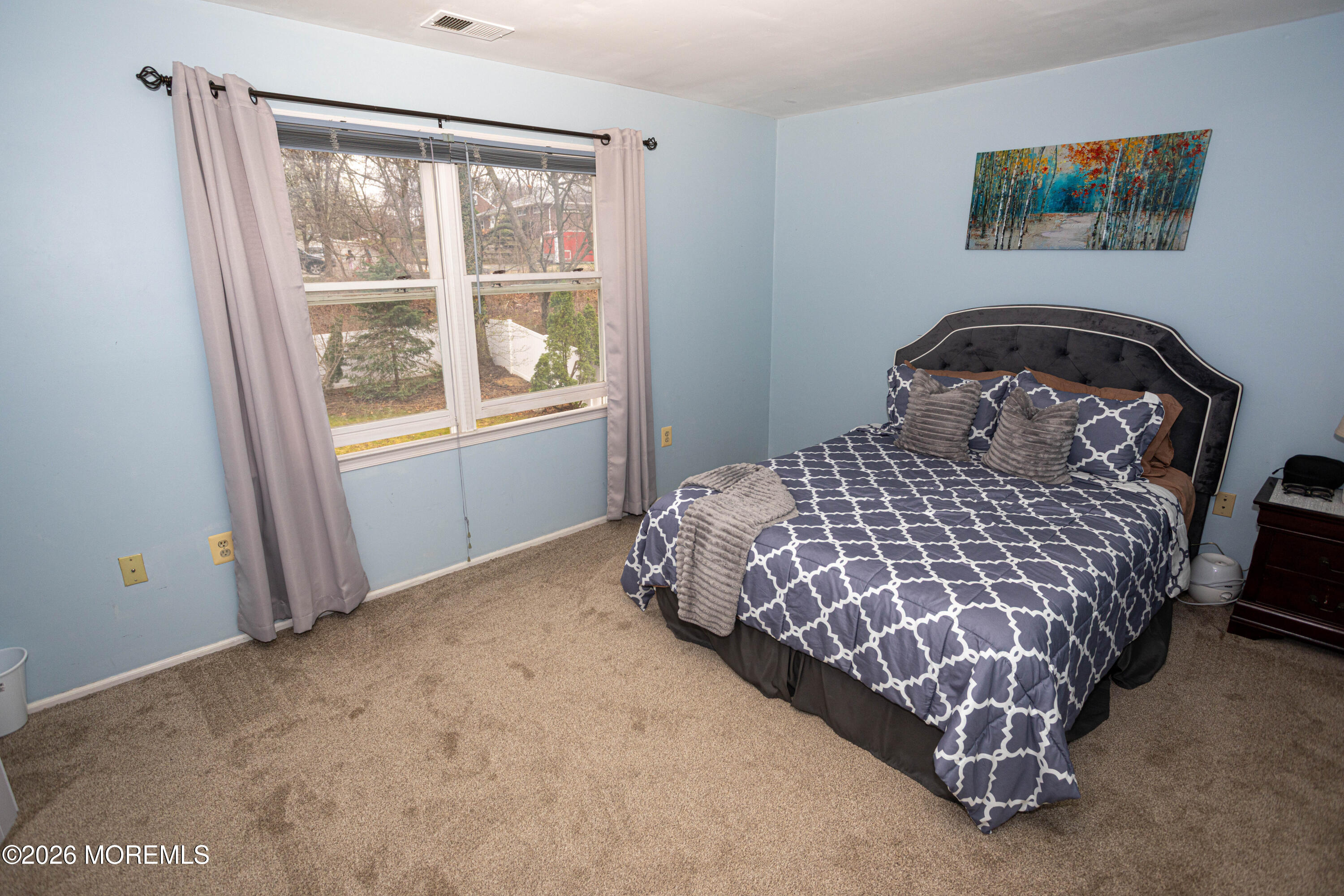 31 Scarlet Drive Parlin, NJ 08859 - Photo 41 of 67 a bedroom with a bed and a window