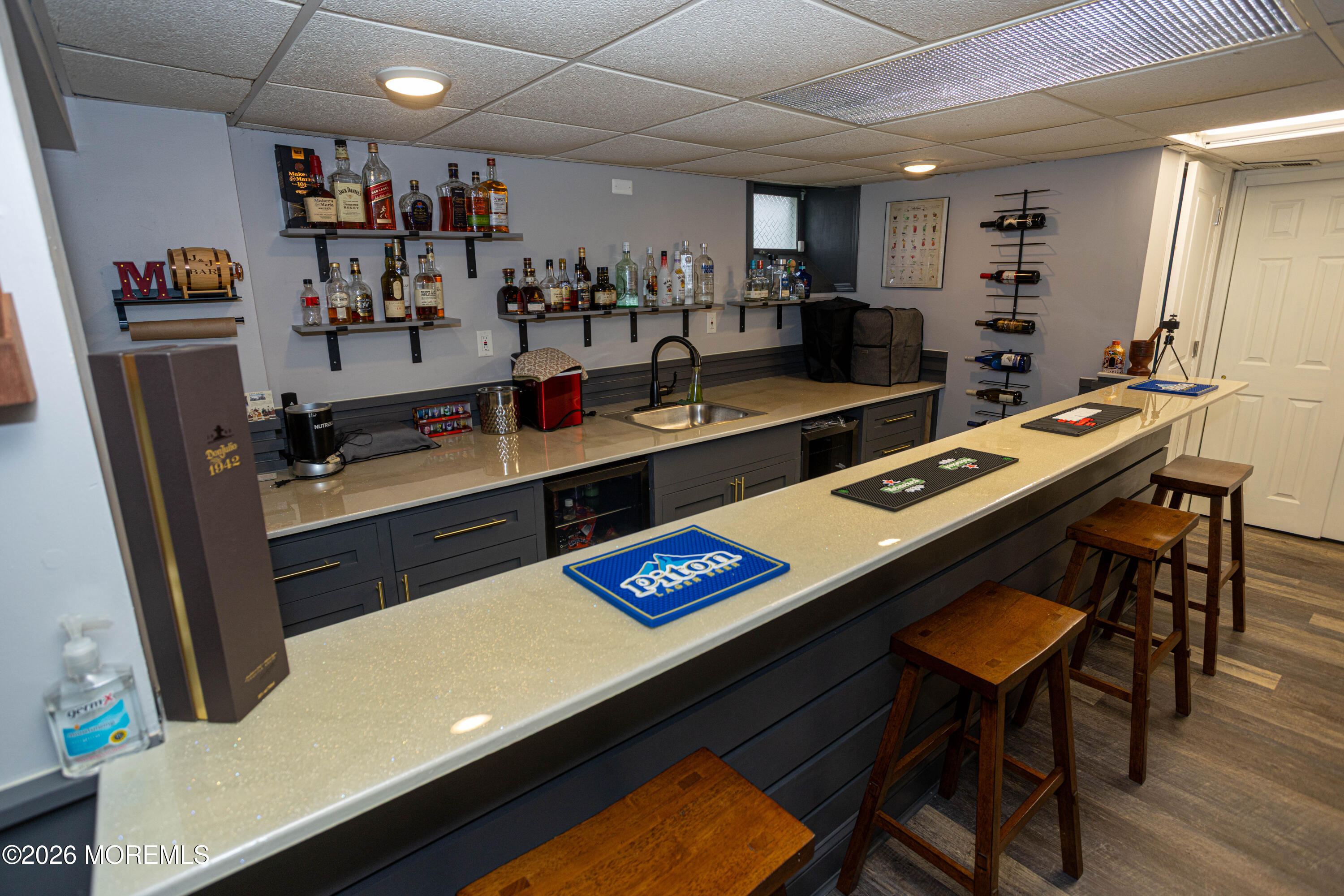 31 Scarlet Drive Parlin, NJ 08859 - Photo 52 of 67 a room with stainless steel appliances lots of furniture and wooden floors