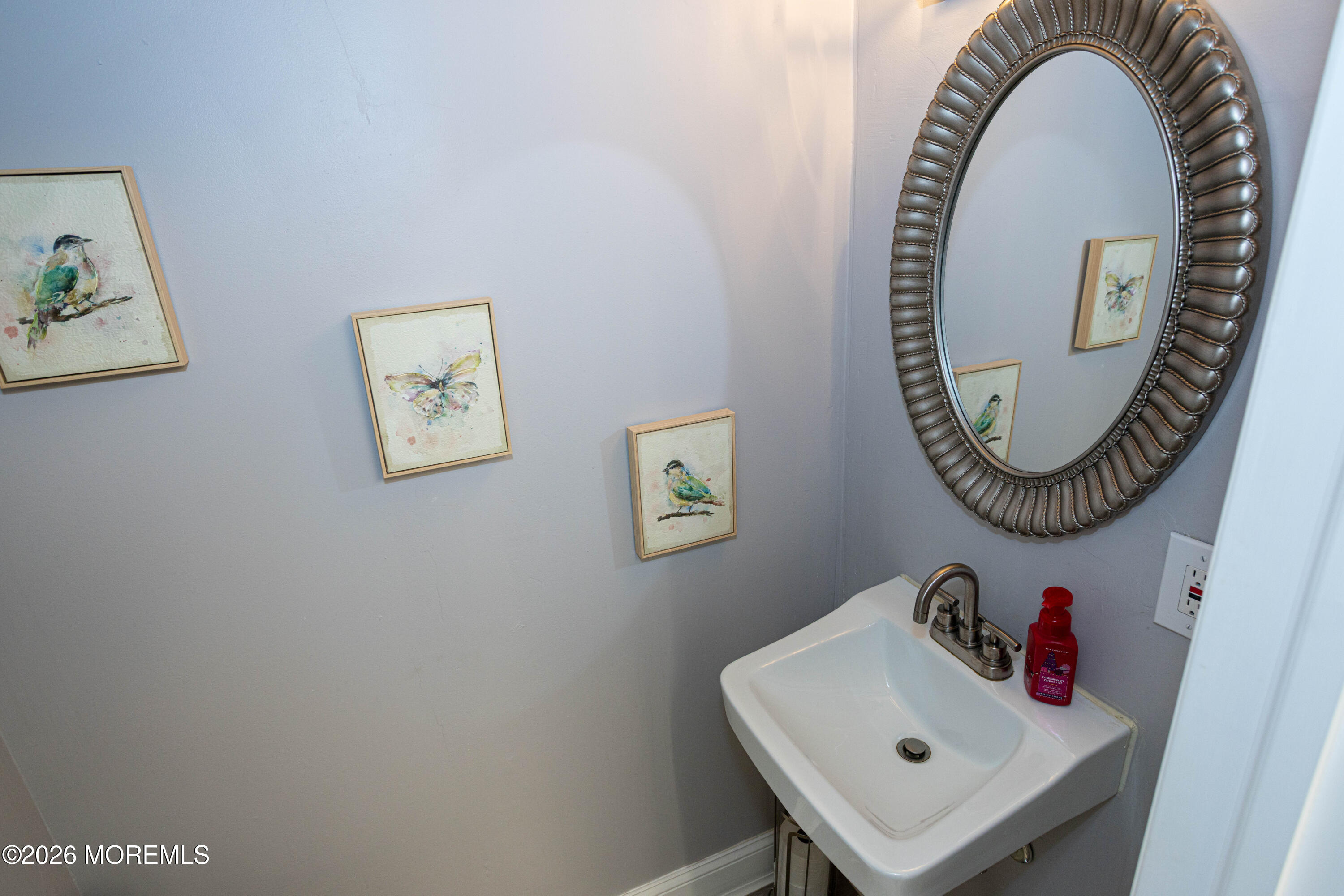 31 Scarlet Drive Parlin, NJ 08859 - Photo 57 of 67 a bathroom with a sink and a mirror