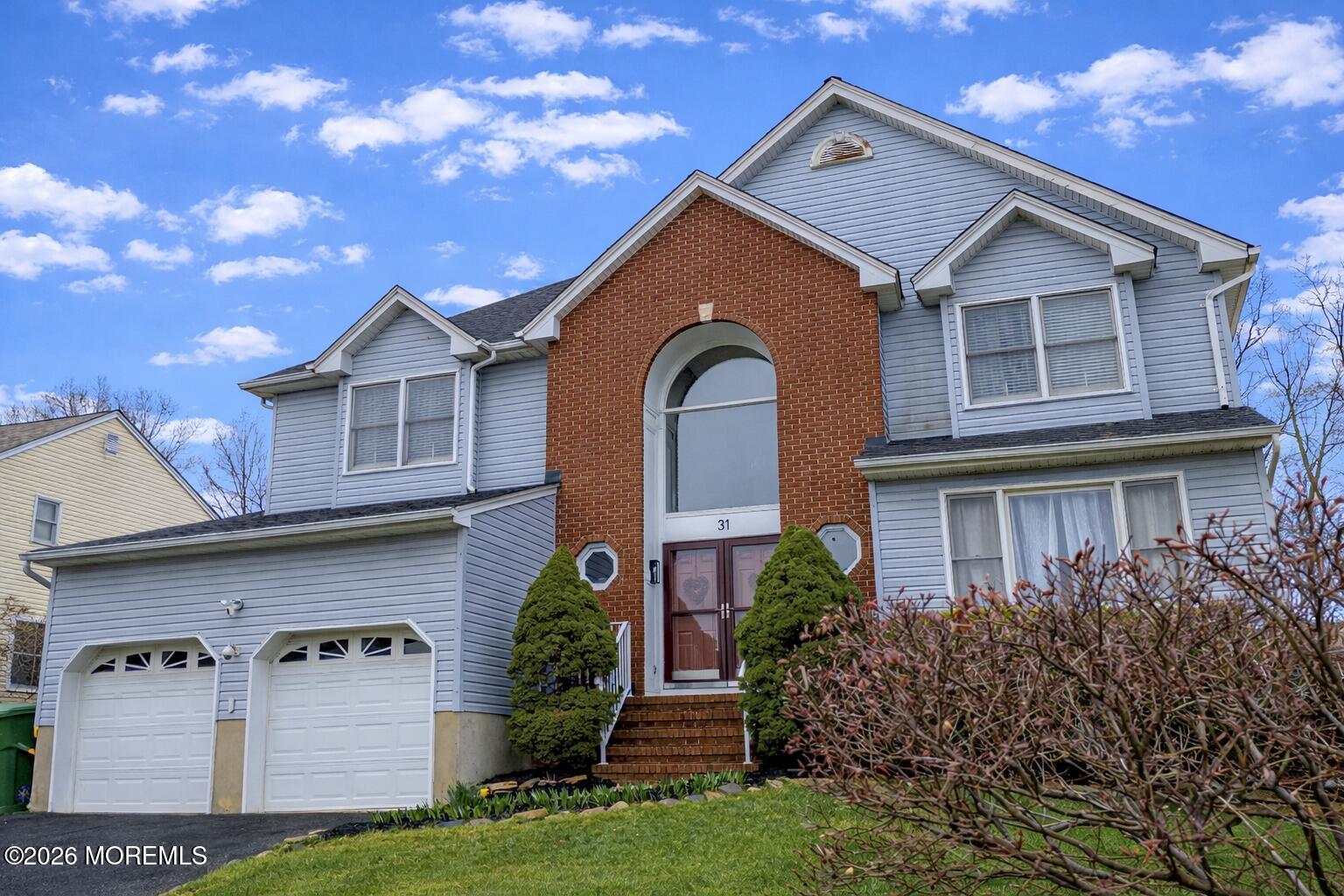 31 Scarlet Drive Parlin, NJ 08859 - Photo 67 of 67 a front view of a house with garden