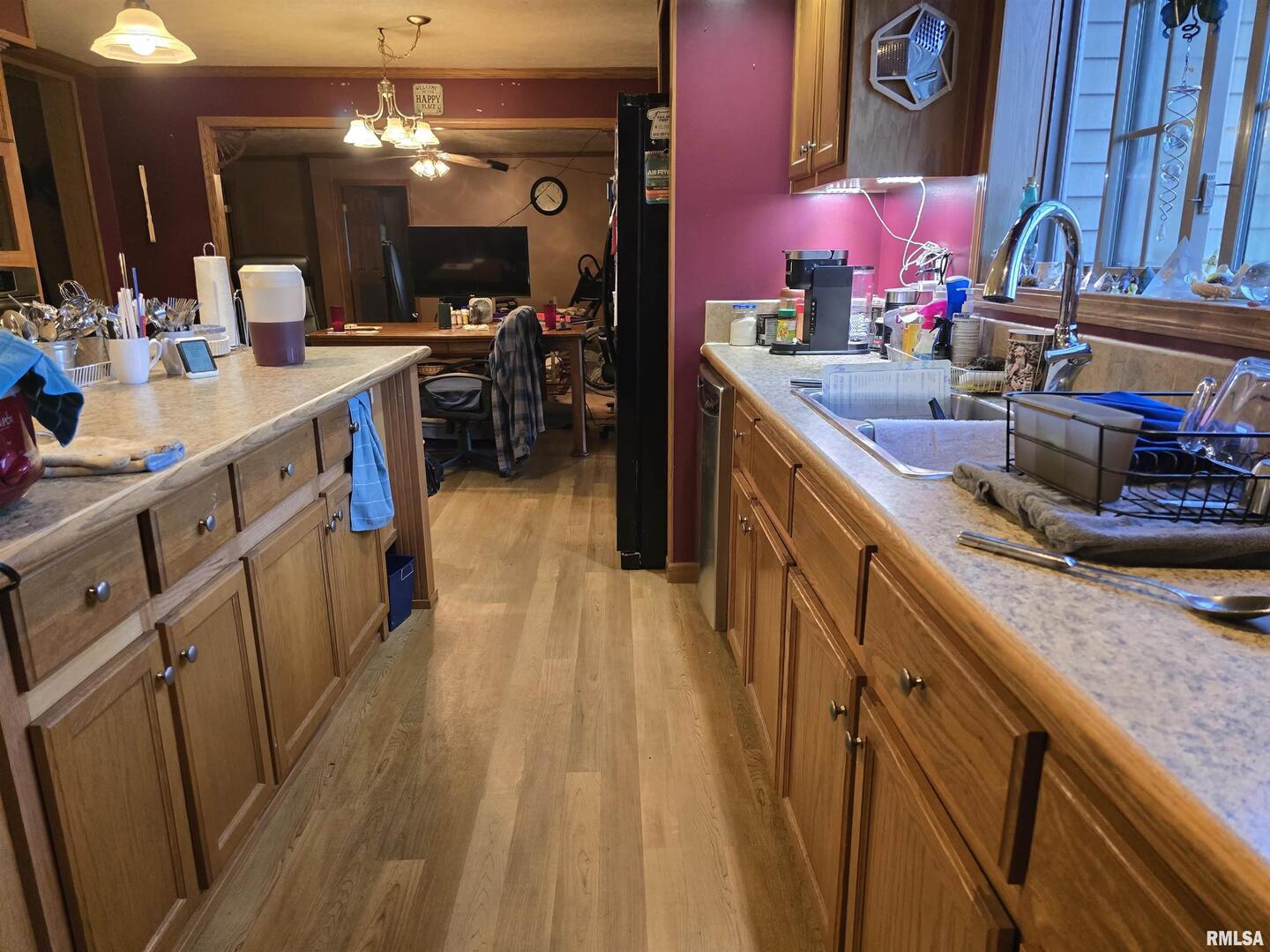 13960 Meridian Road Carterville, IL 62918 - Photo 11 of 18 a kitchen with stainless steel appliances granite countertop a sink stove and cabinets