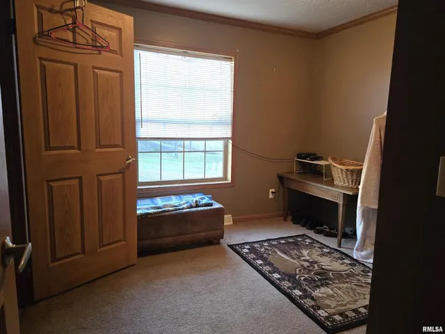 a kitchen with a stove and a cabinet