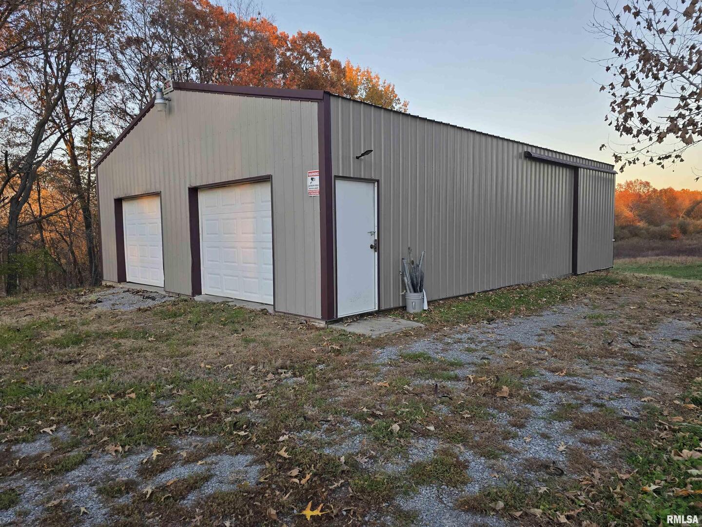 13960 Meridian Road Carterville, IL 62918 - Photo 18 of 18 a backyard of house with large tree