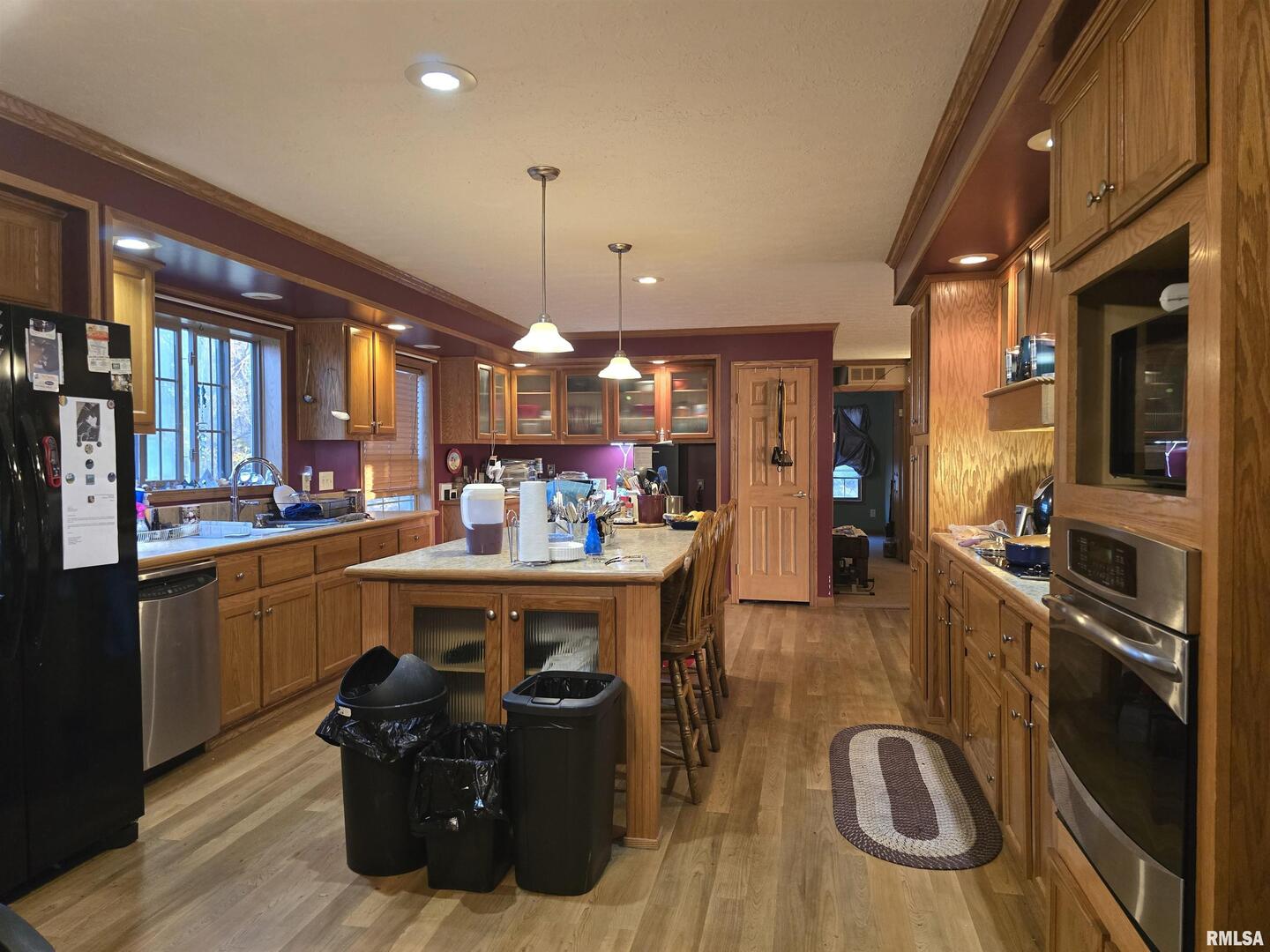 13960 Meridian Road Carterville, IL 62918 - Photo 9 of 18 a kitchen with stainless steel appliances granite countertop a refrigerator a stove and a sink
