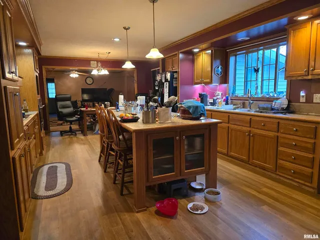 a kitchen with a sink and cabinets