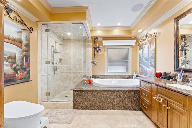 a spacious bathroom with a granite countertop sink a mirror and a shower