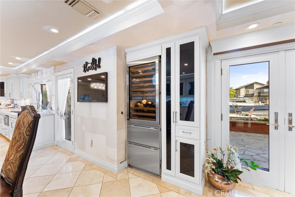 3781 Ragtime Circle Huntington Beach, CA 92649 - Photo 29 of 55 a view of a hallway with wooden floor and windows