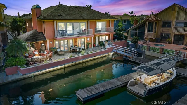 a living room with fireplace furniture and a flat screen tv