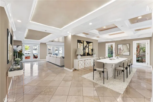 a spacious bathroom with a double vanity sink and a mirror