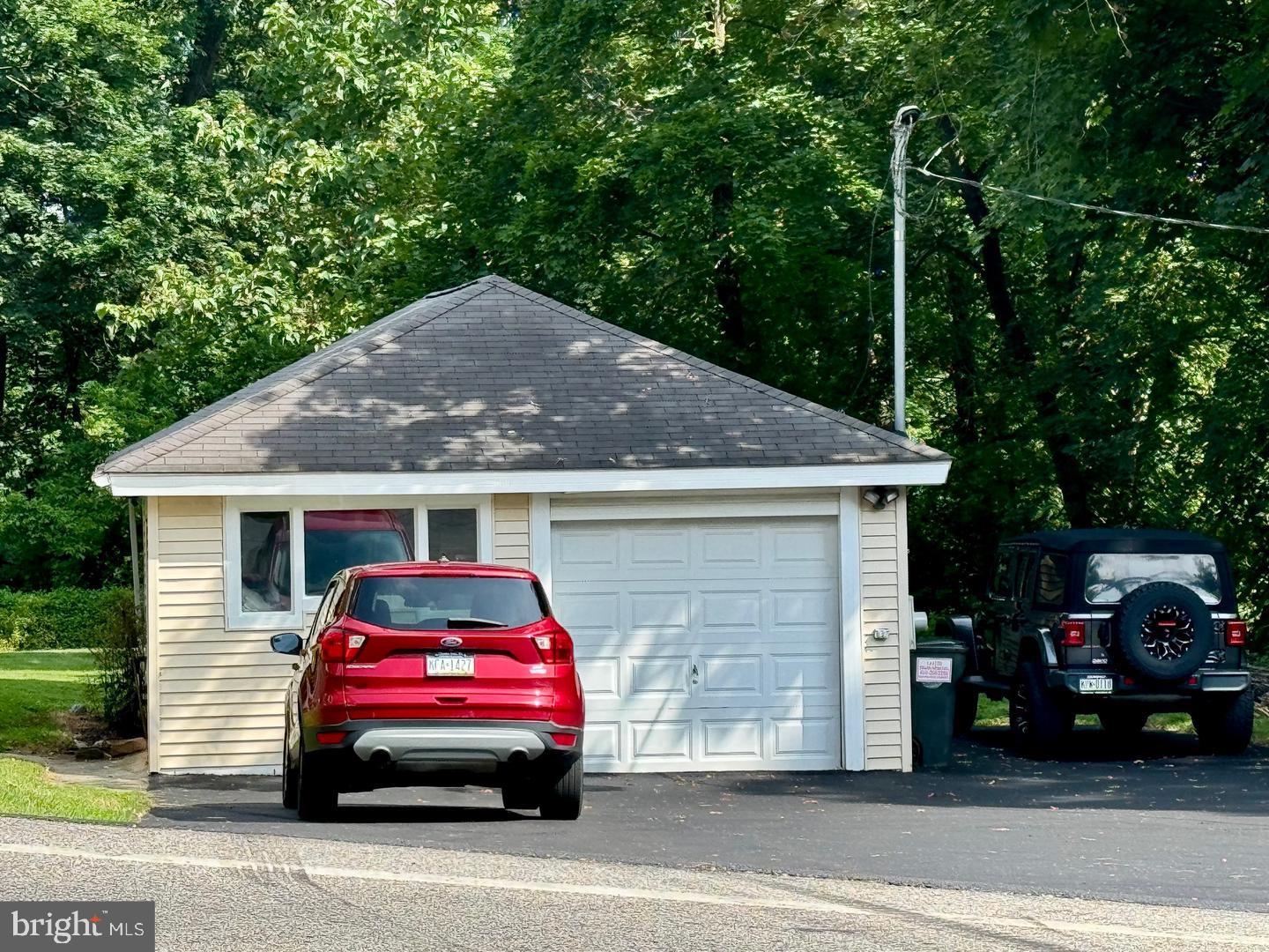 692 Lenni Road Aston, PA 19014 - Photo 24 of 28 a car parked in front of a house