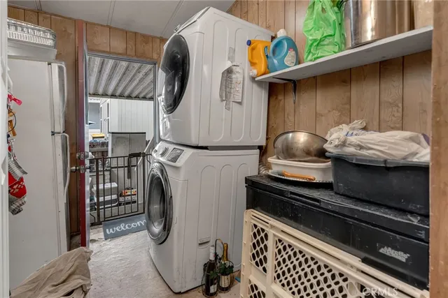a kitchen with a stove and a refrigerator