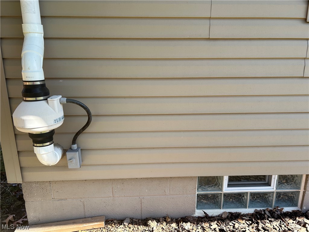 766 Bridge Road Akron, OH 44312 - Photo 32 of 34 Radon system
glass block windows