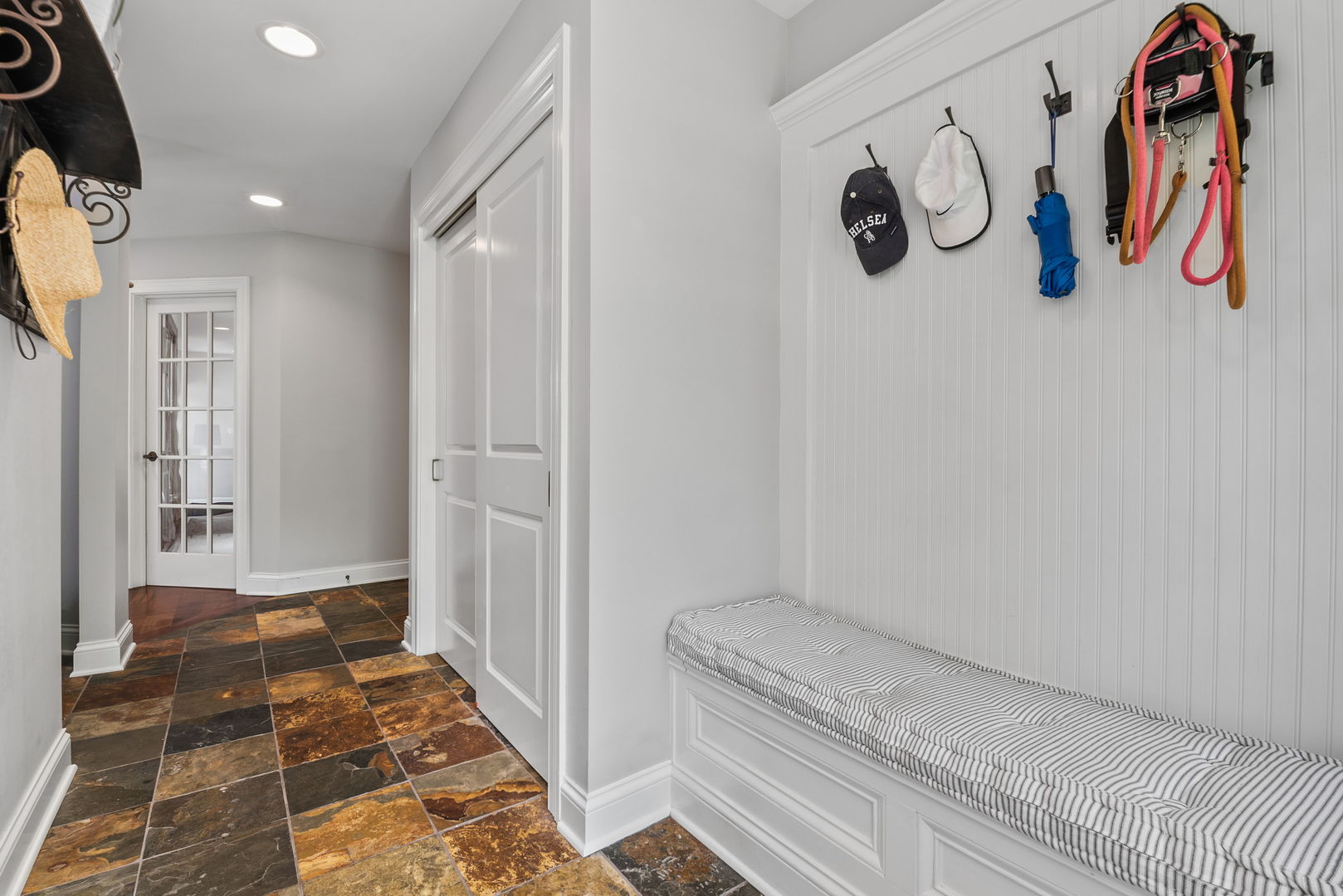 1209 Dunstan Road Geneva, IL 60134 - Photo 11 of 27 a bathroom with a walk in closet and mirror