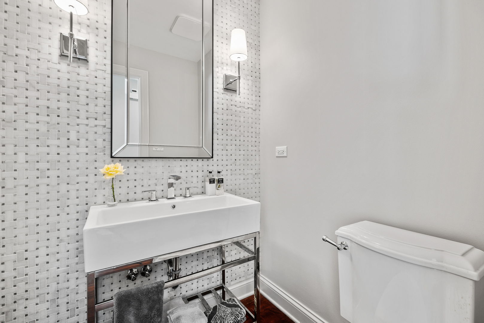 1209 Dunstan Road Geneva, IL 60134 - Photo 12 of 27 a bathroom with a sink a toilet and mirror