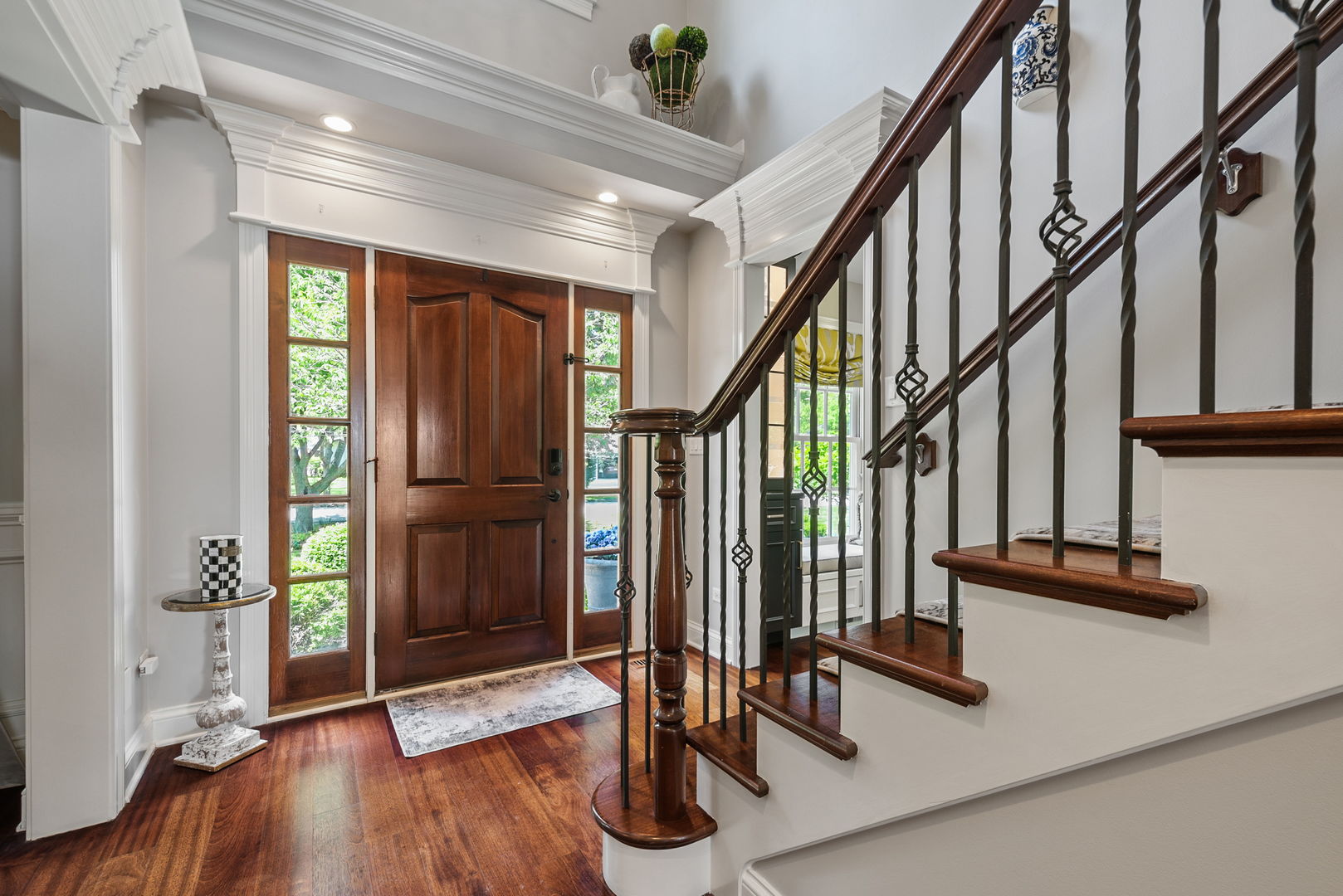 1209 Dunstan Road Geneva, IL 60134 - Photo 13 of 27 a view of an entryway with wooden floor and door